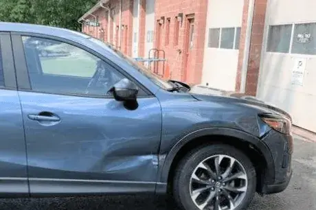 Vehicle damage before repair at Full Tilt