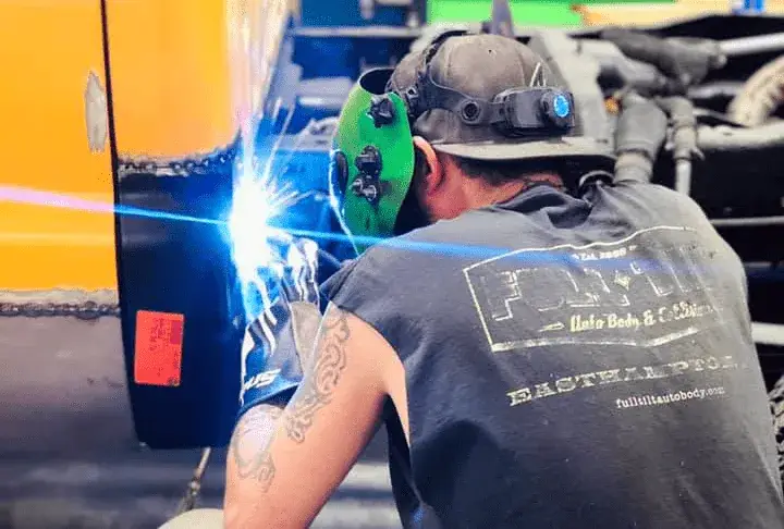 Auto body collision repair work in the Full Tilt shop